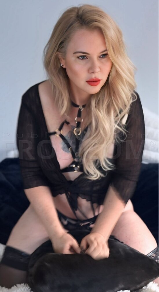Nicole Natural Blonde Blue eyes.